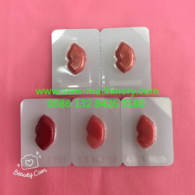 Automatic lip gloss liquid packing machine for cosometic Automatic lip gloss liquid packing machine for cosometic