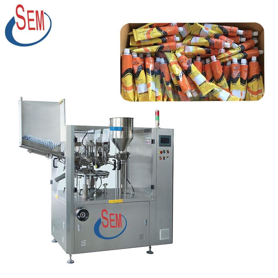 Aluminum tube filling and sealing machine Aluminum tube filling and sealing machine